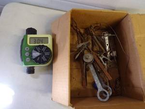 lot 82 image: Lawn Hose Timer and Gopher Traps