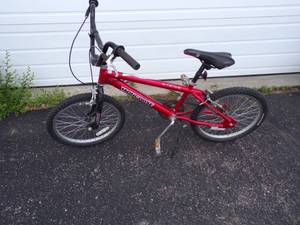 lot 140 image: Red Mongoose Bike