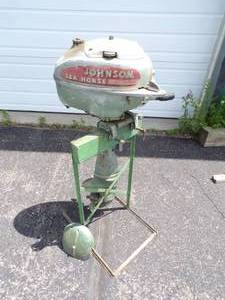 lot 168 image: Johnson Sea Horse Outboard Motor with stand