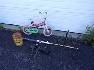 lot 201 image: American Flag with pole, plant stand, Bike, cordless drill and vintage tin