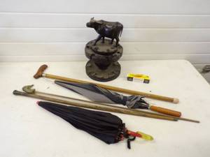 lot 283 image: Pipe holder, Pipe, Canes and umbrellas