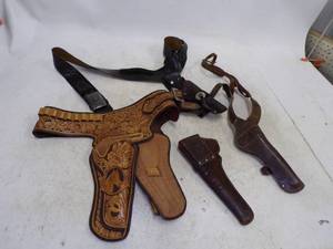 lot 318 image: Pistol Holsters and Belts
