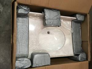 lot 32 image: HOME DECORATORS COLLECTION 31 in. Stone Effects Vanity Top in Oasis with White Sink (NOT USED)