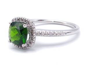 lot 26 image: Natural Green Tourmaline and Diamond Halo Ring in 14k White Gold $3650