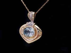 lot 62 image: Ladies Aqua and Diamond Estate Pendant in 14k Yellow Gold $1750