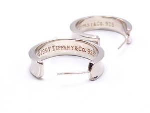 lot 65 image: Tiffany & Co Sterling Silver Hoop Earrings $400