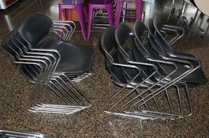lot 57 image: 10 Black Plastic Chairs