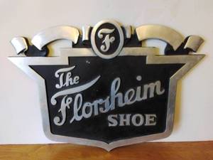 Old Metal Florsheim Shoe Sign