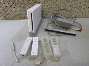 lot 34 image: Wii Game System with Controllers an...