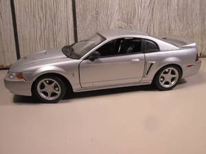 lot 132 image: Maisto Die Cast 1999 Mustang GT 11...