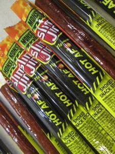 lot 195 image: 12 Slim Jim Hot AF Smoked Snack Sti...