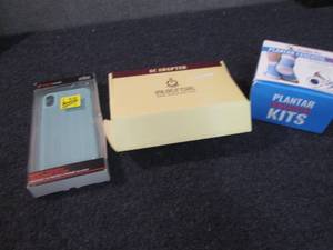 lot 21 image: iPhone Xs Case, Ac Adapter, Planter...