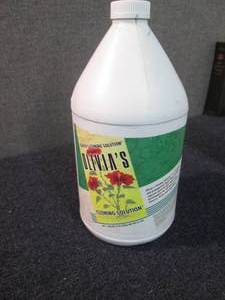 lot 87 image: Gallon of Olivias Cloning Solution...