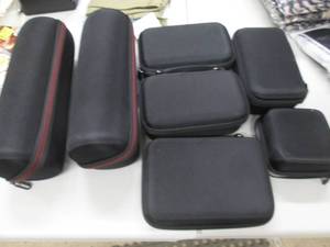 lot 210 image: 7 Zip Travel Cases...
