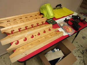 lot 334 image: WOOD-CRAFTED FISHING ROD HOLDERS, MESH BAIT BAG, SPORTMANS GLASSES, ASSORTED FISHING SUPPLIES