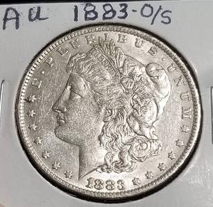 lot 13 image: 1883 OS MORGAN SILVER DOLLAR AU