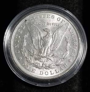 lot 18 image: 1887 MORGAN SILVER DOLLAR IN AIRTITE HOLDER
