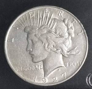 lot 26 image: 1927-D PEACE SILVER DOLLAR BLACK HOLDER