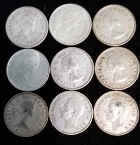 lot 42 image: GROUP OF 9 SILVER CANADA QUARTERS