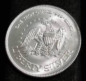 lot 47 image: 1 TROY OZ. .999 FINE SILVER LIBERTY ROUND