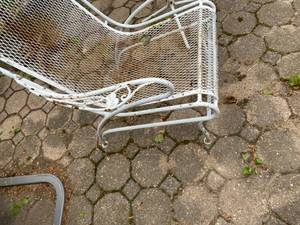 2 White metal chairs and small table