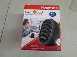 lot 22 image: Heat Bud, ceramic Personal heater 1...