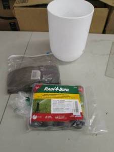 lot 23 image: white trash can with charcol filter...