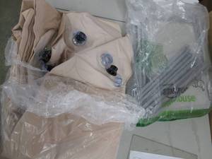 lot 29 image: A gray clapsable storable unit, 22x...