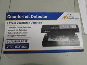 lot 63 image: 4 phase counterfeit detection black...