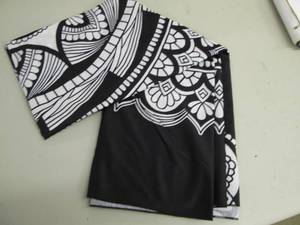 lot 73 image: A box full of table cloths differen...