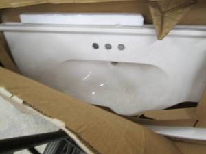 lot 103 image: one single sink. Marble look...