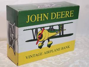 lot 10 image: Jonn Deere Metal Replica 1934 Stearman Bi-Plane Bank