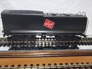 lot 69 image: O Scale Milwaukee Road Hiawatha Tender Car.