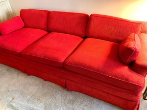 lot 23 image: Soft Red Upholstered Sofa with Deep Cushions