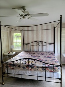 lot 65 image: King Metal Canopy Bed Frame And Mattress