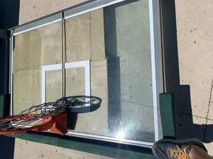 lot 24 image: Former NDSU Bison Basketball Glass Backboard  50 x 72
