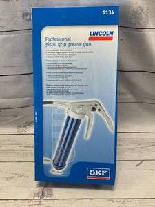 lot 28 image: New in Box Lincoln Grease Gun
