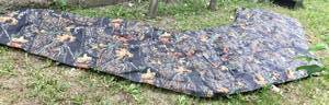 lot 36 image: Unused Hunting Field Blind (tapers from 12 to 20)