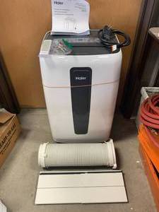 lot 68 image: Haier HPC12XCR Portable Air Conditioner (works great)