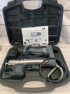 lot 73 image: Nikota 12 Volt Cordless Grease Gun (works great)