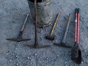 Plastic Barrel Of Assorted Hand Tools
