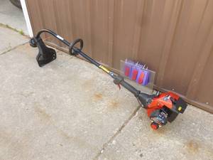 Craftsman 2 cycle weed trimmer. Tested & works. Like new. As shown.