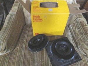 lot 11 image: Kodak Pocket Carousel Projector In ...