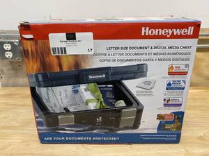 lot 17 image: HONEYWELL 0.24 cu. ft. Molded Fire Resistant and Waterproof Portable Chest with Carry Handle, Key and Double Latch Lock