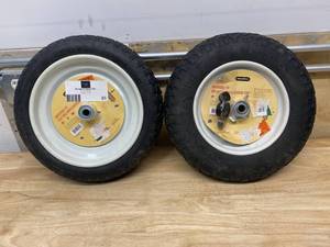 lot 24 image: MARATHON Lot of two-  14.5 in. Flat Free Universal Wheelbarrow Wheel