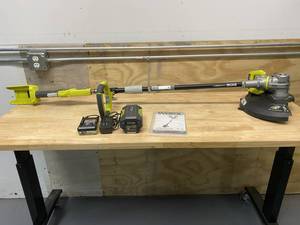 lot 61 image: RYOBI 40-Volt Lithium-Ion Cordless String TrimmerEdger - 2.6 Ah Battery and Charger Included