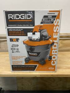 lot 63 image: RIGID 9 Gal. 18-Volt Cordless WetDry Shop Vacuum (Tool Only) with Filter, Hose and Accessories