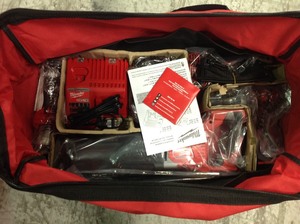 Milwaukee M18 18-Volt Lithium-Ion Cordless Combo Tool Kit (4-Tool) with (2) 3.0Ah Batteries, 1-Charger, 1-Tool Bag in like new condition