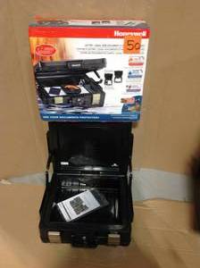 lot 50 image: Honeywell 0.39 cu. ft. Molded Fire Resistant and Waterproof Legal Document Storage Chest with Key and Double Latch Lock in good condition