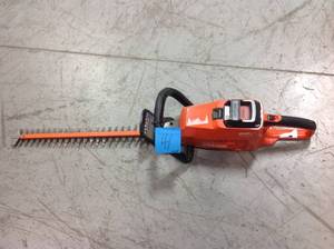 lot 41 image: 24 in. 58-Volt Lithium-Ion Brushless Cordless Hedge Trimmer  USED IN GOOD CONDITIONS MISSING CHARGER 